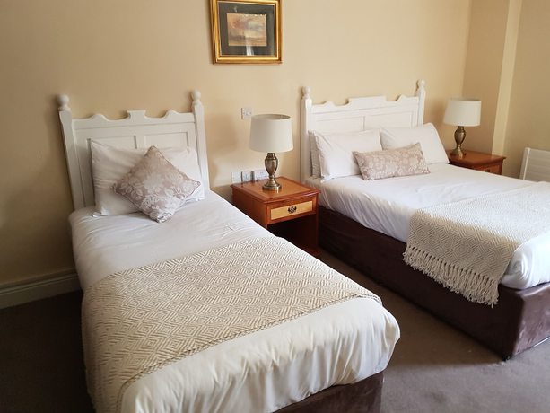 Imagen de la habitación del Hotel The Mercantile. Foto 16