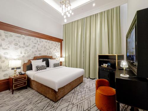 Imagen de la habitación del Hotel The Merchant Baku. Foto 2