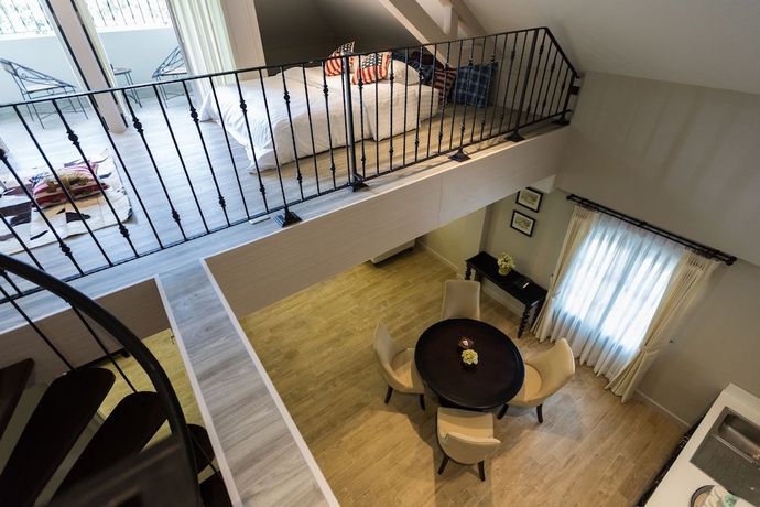Imagen de la habitación del Hotel The Merchant House Chiangmai. Foto 4