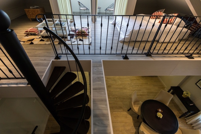 Imagen de la habitación del Hotel The Merchant House Chiangmai. Foto 6