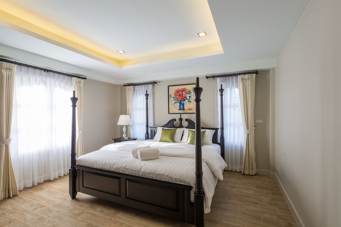 Imagen de la habitación del Hotel The Merchant House Chiangmai. Foto 9