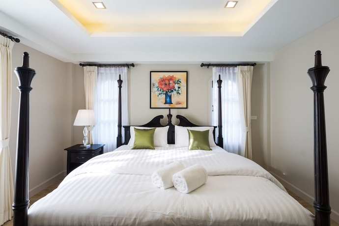 Imagen de la habitación del Hotel The Merchant House Chiangmai. Foto 10