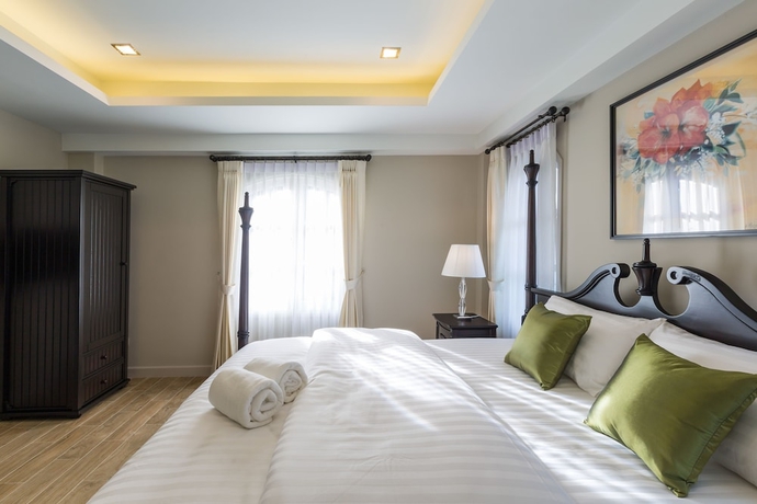 Imagen de la habitación del Hotel The Merchant House Chiangmai. Foto 13