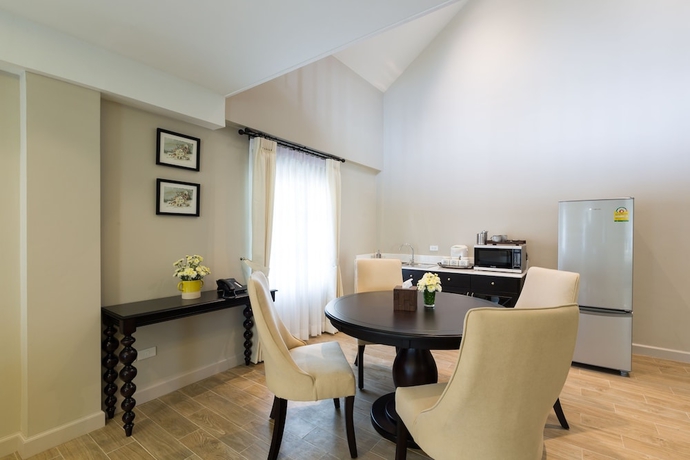 Imagen de la habitación del Hotel The Merchant House Chiangmai. Foto 15