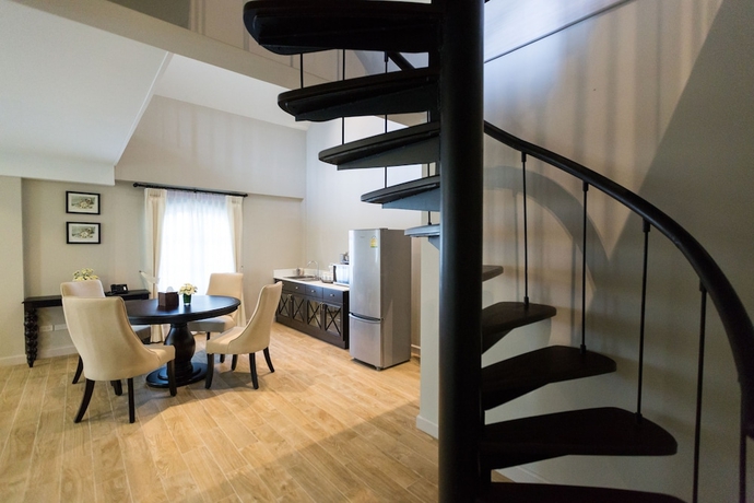 Imagen de la habitación del Hotel The Merchant House Chiangmai. Foto 16