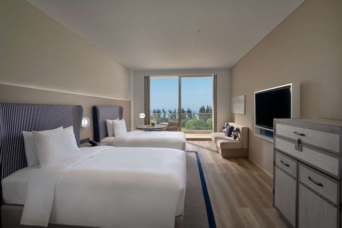 Imagen de la habitación del Hotel The Mermoon Resort Hainan Tufu Bay, Tapestry By Hilton. Foto 10
