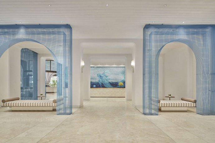 Imagen de los interiores del Hotel The Mermoon Resort Hainan Tufu Bay, Tapestry By Hilton. Foto 20