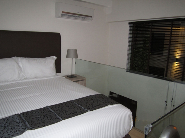 Imagen de la habitación del Hotel The Mesui. Foto 2