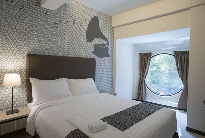Imagen de la habitación del Hotel The Mesui. Foto 3