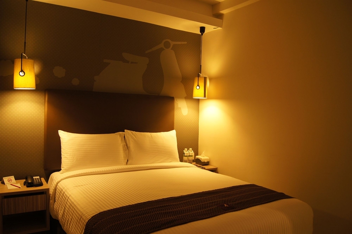 Imagen de la habitación del Hotel The Mesui. Foto 6