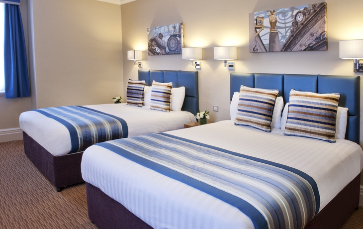 Imagen de la habitación del Hotel The Met. Foto 6