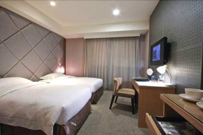 Imagen de la habitación del Hotel The Metro Taichung. Foto 2