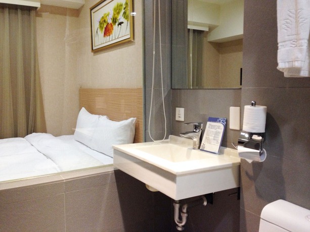 Imagen de la habitación del Hotel The Metro Taichung. Foto 6