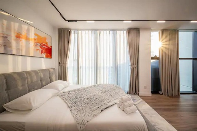 Imagen de la habitación del Hotel The Metropole Thu Thiem Luxury Vacation. Foto 13