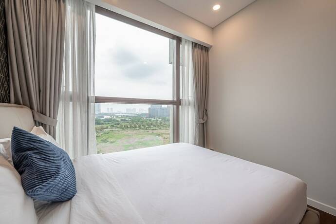 Imagen de la habitación del Hotel The Metropole Thu Thiem Luxury Vacation. Foto 17