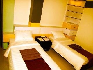Imagen de la habitación del Hotel The Metropolis Suites Davao. Foto 5