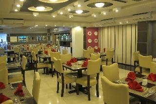 Imagen del bar/restaurante del Hotel The Metropolis Suites Davao. Foto 4