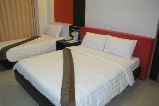 Imagen de la habitación del Hotel The Metropolis Suites Davao. Foto 10