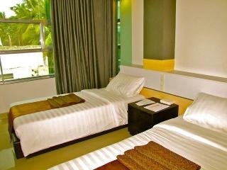 Imagen de la habitación del Hotel The Metropolis Suites Davao. Foto 11