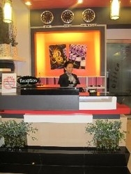 Imagen de la habitación del Hotel The Metropolis Suites Davao. Foto 12