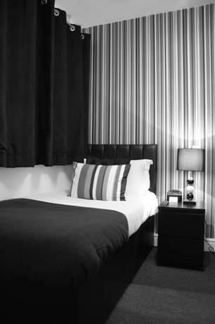 Imagen de la habitación del Hotel The Metropolitan. Foto 2