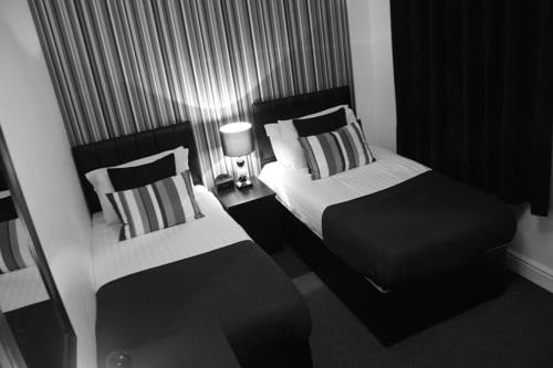 Imagen de la habitación del Hotel The Metropolitan. Foto 3