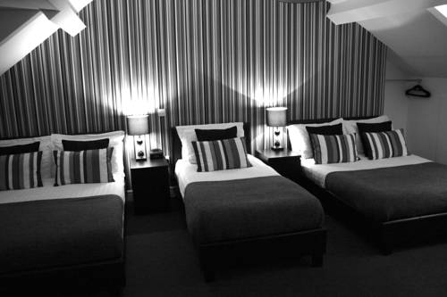 Imagen de la habitación del Hotel The Metropolitan. Foto 5