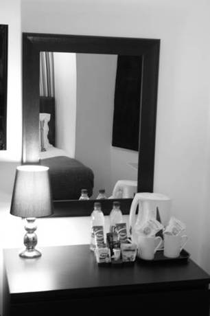 Imagen de la habitación del Hotel The Metropolitan. Foto 7