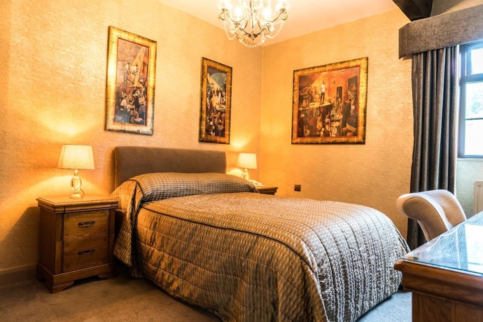 Imagen de la habitación del Hotel The Mews. Foto 14