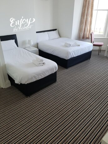 Imagen de la habitación del Hotel The Mews Inn. Foto 16