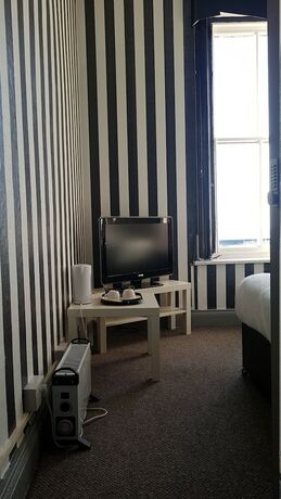 Imagen de la habitación del Hotel The Mews Inn. Foto 19