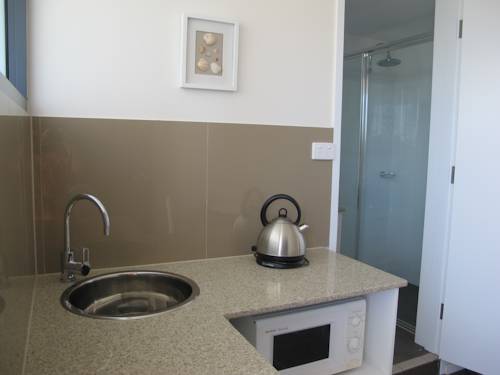 Imagen de la habitación del Hotel The Mid Pacific. Foto 6