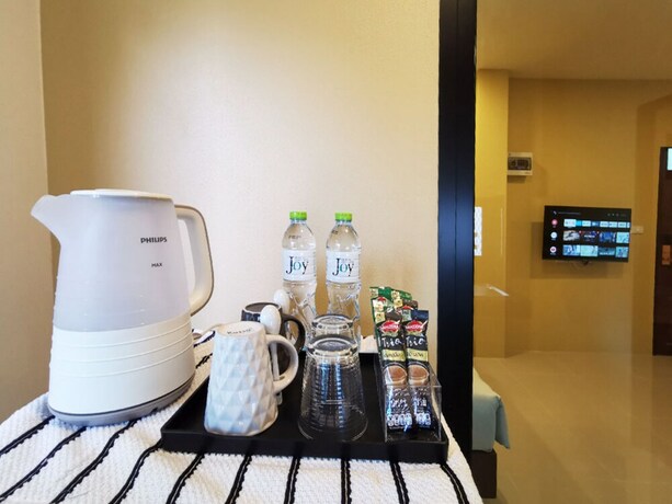 Imagen de la habitación del Hotel The Middle Town Sha. Foto 18