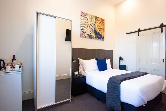 Imagen de la habitación del Hotel The Mile End. Foto 19