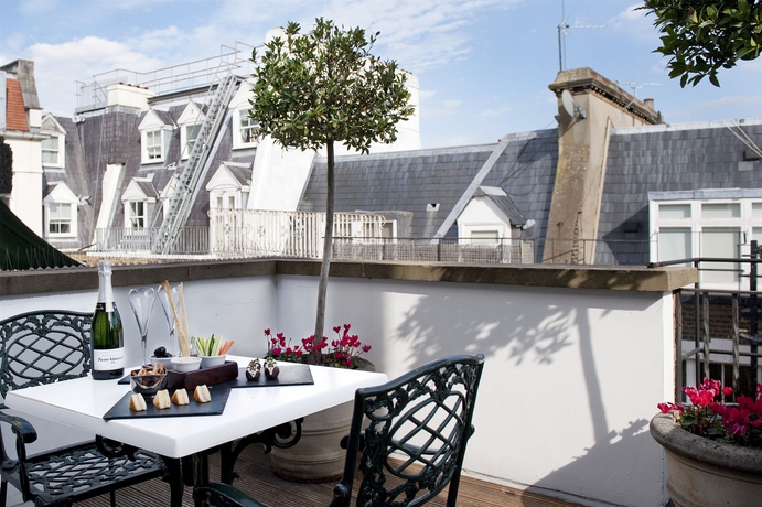 Imagen de los exteriores del Hotel The Milestone. Foto 12