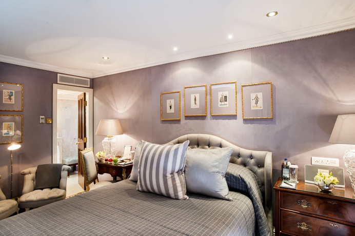 Imagen de la habitación del Hotel The Milestone. Foto 8