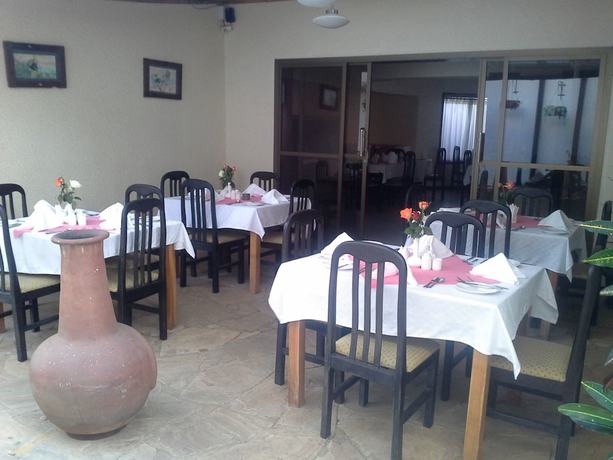 Imagen del bar/restaurante del Hotel The Milimani Lodge. Foto 2