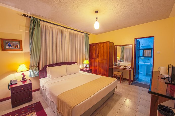 Imagen de la habitación del Hotel The Milimani Lodge. Foto 9