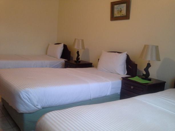 Imagen de la habitación del Hotel The Milimani Lodge. Foto 18
