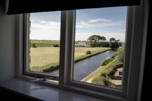 Imagen de la habitación del Hotel The Mill At Conder Green. Foto 8