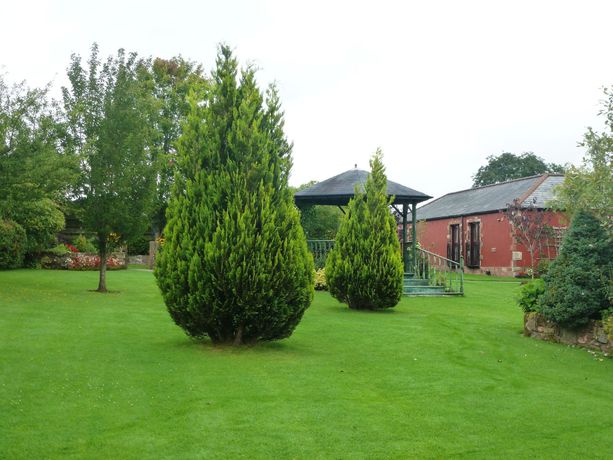 Imagen de los exteriores del Hotel The Mill Forge. Foto 11