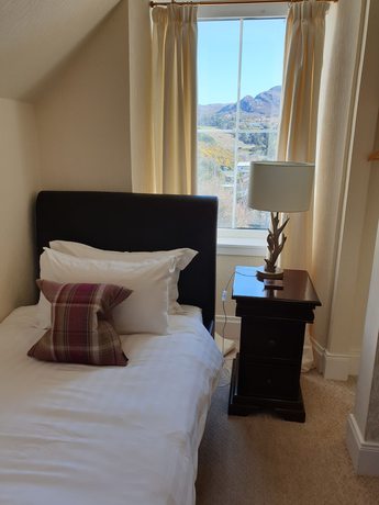 Imagen de la habitación del Hotel The Millcroft. Foto 7