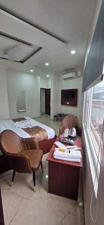 Imagen de la habitación del Hotel The Millennium Kashi. Foto 11