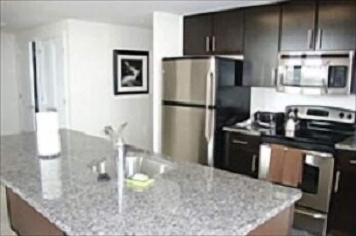Imagen de la habitación del Hotel The Millennium at Metropolitan Park. Foto 4
