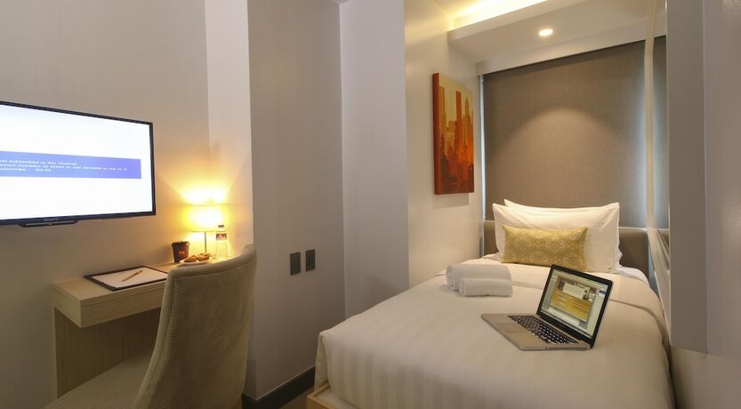 Imagen de la habitación del Hotel The Mini Suites - Eton Tower Makati. Foto 14