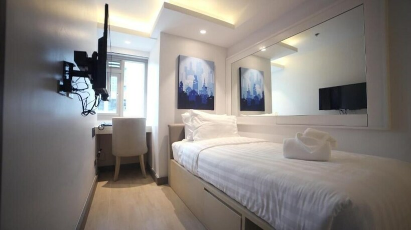 Imagen de la habitación del Hotel The Mini Suites - Eton Tower Makati. Foto 20