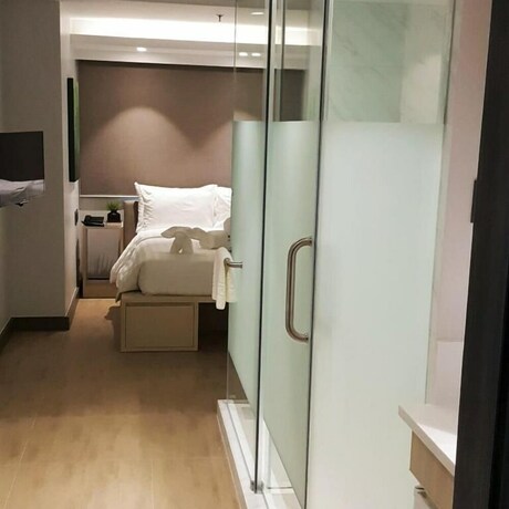 Imagen de la habitación del Hotel The Mini Suites - Eton Tower Makati. Foto 21
