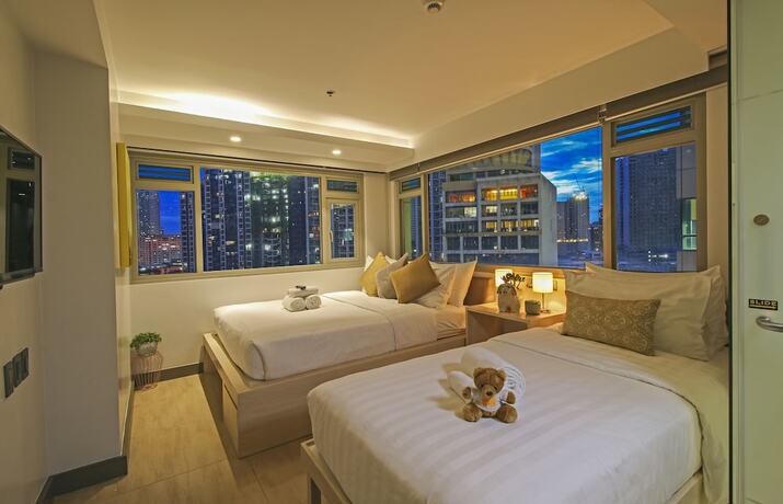 Imagen de la habitación del Hotel The Mini Suites - Eton Tower Makati. Foto 23