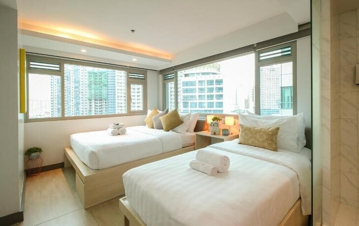 Imagen de la habitación del Hotel The Mini Suites - Eton Tower Makati. Foto 27