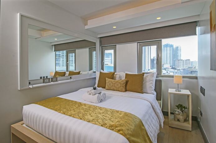 Imagen de la habitación del Hotel The Mini Suites - Eton Tower Makati. Foto 32
